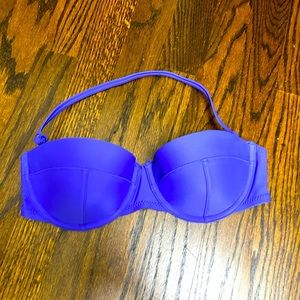 Never worn! Strapless bandeau bikini top. Fits size 32-34B/C. Beautiful purple!